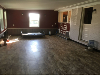 Half doors between play area and kitchen allow interaction